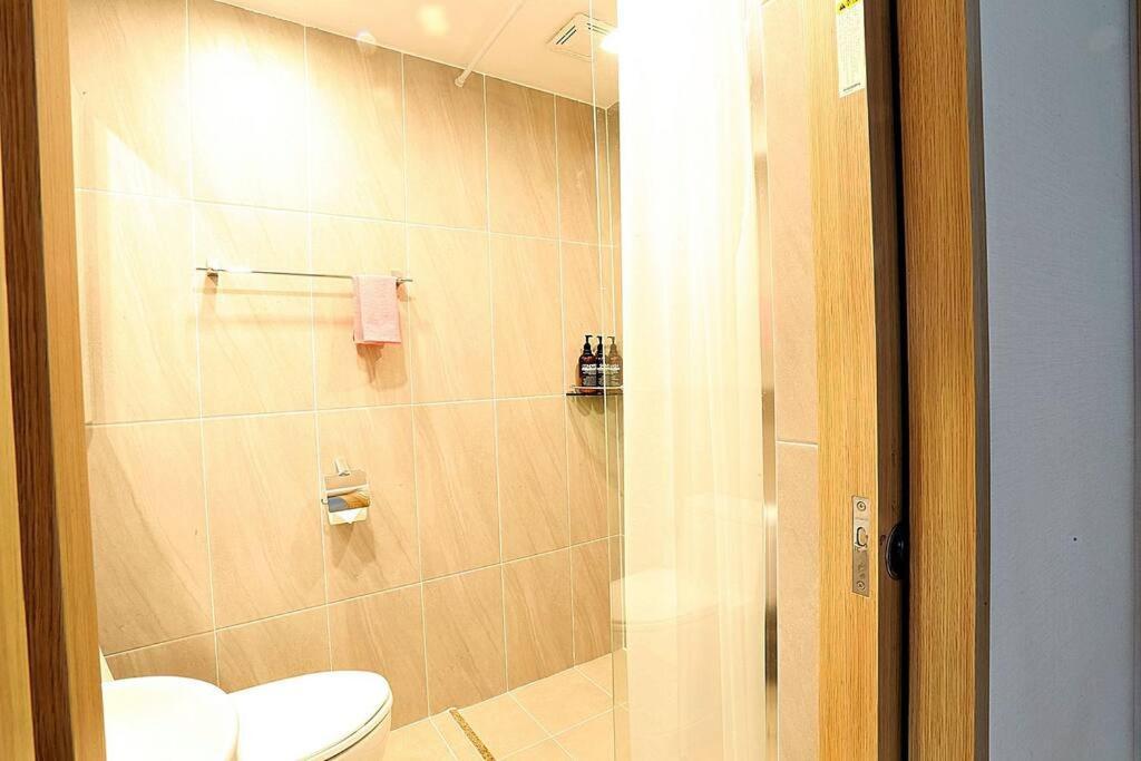 Coveted Palms Village Pension Jeju Exterior photo
